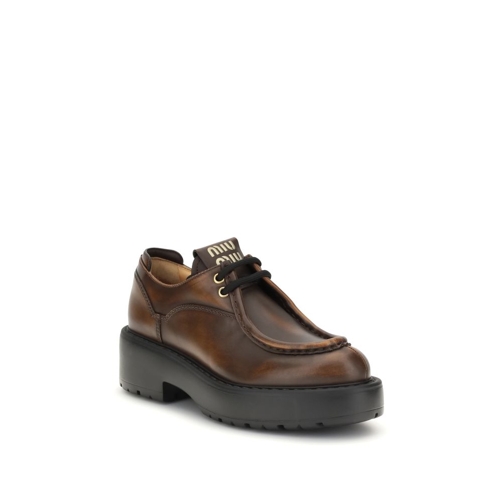 Miu Miu Brown Calf Leather Bos Taurus Platform Loafers
